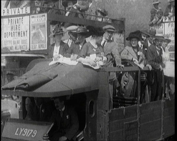 Cars, Buses and Pedestrians Arriving for the 1920 Epsom Derby, 1920. Creator: British Pathe Ltd.