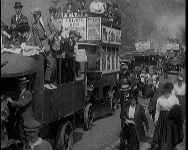 Cars, Buses and Pedestrians Arriving for the 1920 Epsom Derby, 1920. Creator: British Pathe Ltd.