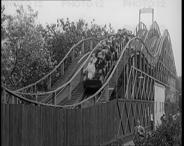 A Large Group of Female Civilians Enjoying  a Roller Coaster Ride, 1926. Creator: British Pathe Ltd.