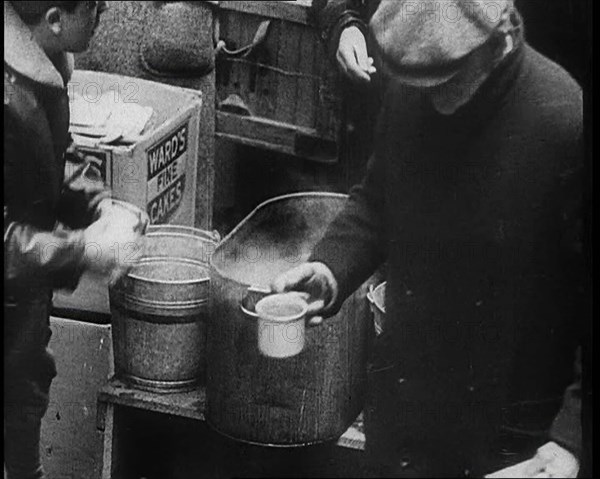 Three Men Receiving Hot Drinks, 1933. Creator: British Pathe Ltd.