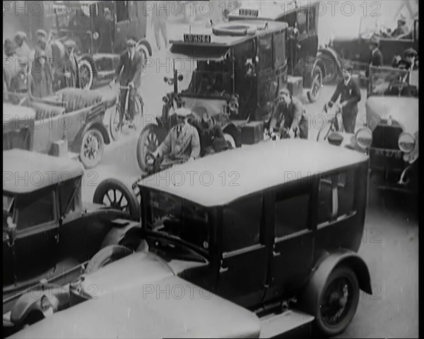 Streets Filled With Heavy Traffic and Pedestrians in London, 1926. Creator: British Pathe Ltd.