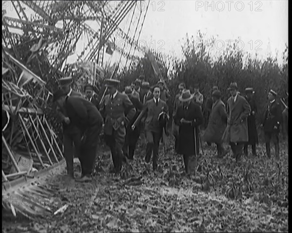 Chief Marshal Sir John Salmond and Other British Officials Walking Around the Wreckage..., 1930. Creator: British Pathe Ltd.