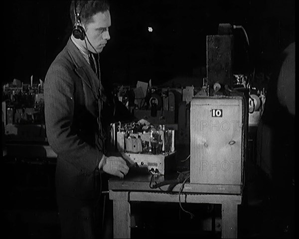 Male Civilian Building a Radio Wireless Set in a Factory, 1931. Creator: British Pathe Ltd.