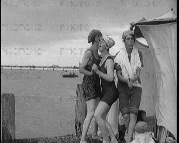 Women in Bathing Costumes on a Beach, 1920. Creator: British Pathe Ltd.