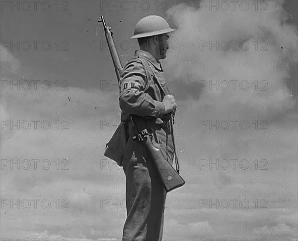 A British Local Defence Volunteer on Guard, 1940. Creator: British Pathe Ltd.