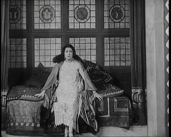 The Female Actor Josie Collins Performing in  a Play With Two Male Actors, 1920s. Creator: British Pathe Ltd.