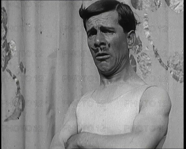 The Music Hall Star Billy Merson Pulling a Variety of Funny Faces, 1920s. Creator: British Pathe Ltd.