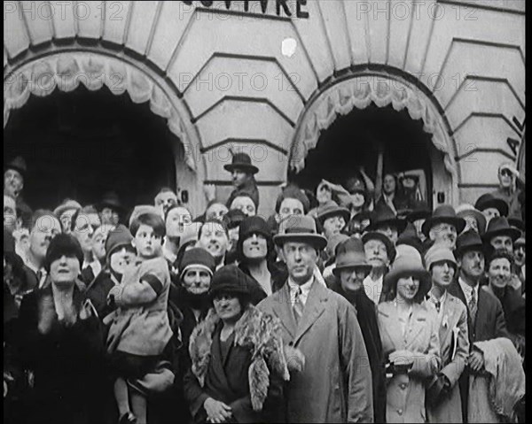 Press and Members of Public Watching Charles Lindbergh and Anne Morrow Lindbergh Waving..., 1920s. Creator: British Pathe Ltd.