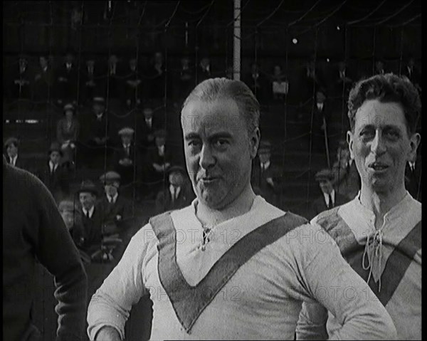 The Comedian George Robey Pulling Faces On a Football Pitch in Front of a Large Crowd, 1920s. Creator: British Pathe Ltd.