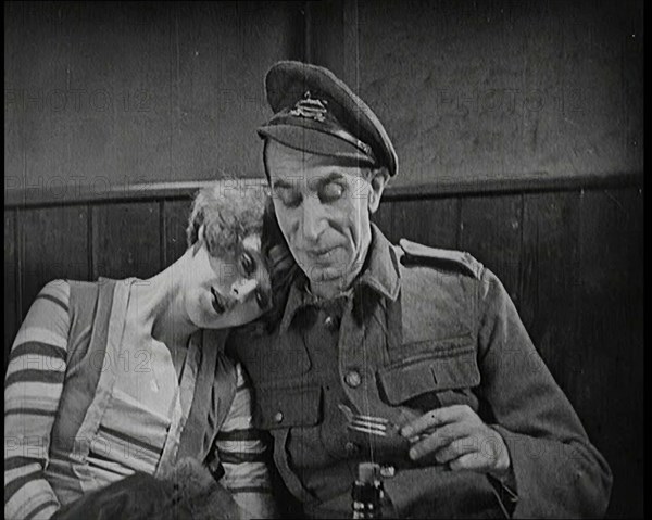 Scene from the Short Silent Feature Film 'Poppies of Flanders'. A Female Actor and a Male..., 1920s. Creator: British Pathe Ltd.