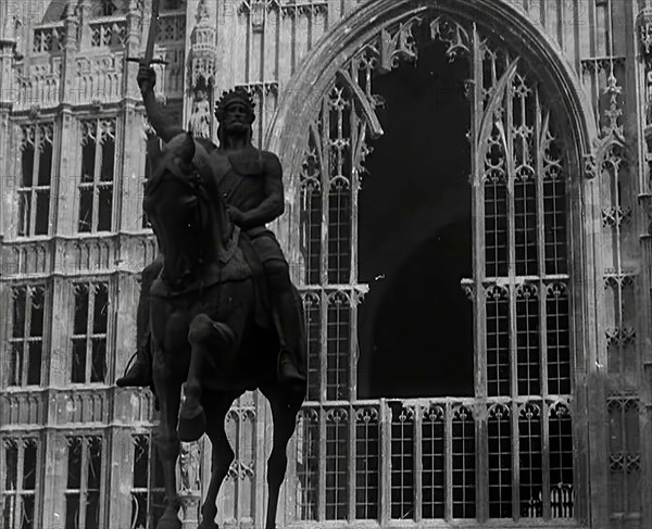 The Palace of Westminster and the Statue of Richard the Lionheart, Damaged by German Bombing, 1941. Creator: British Pathe Ltd.