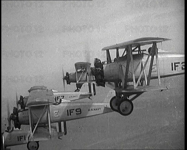 A Fleet of US Fighter Planes Mid Flight, 1920s. Creator: British Pathe Ltd.