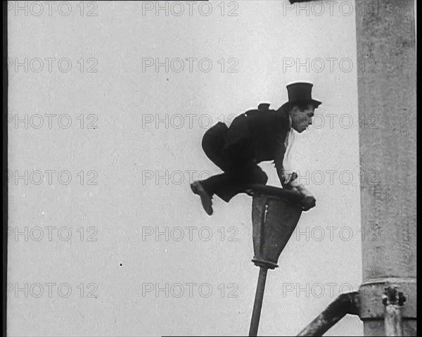 A Man on a Bendy Lamppost, 1930s. Creator: British Pathe Ltd.