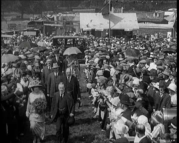 A Group of Politicians Walking Through a Large Crowd of People, 1920s. Creator: British Pathe Ltd.