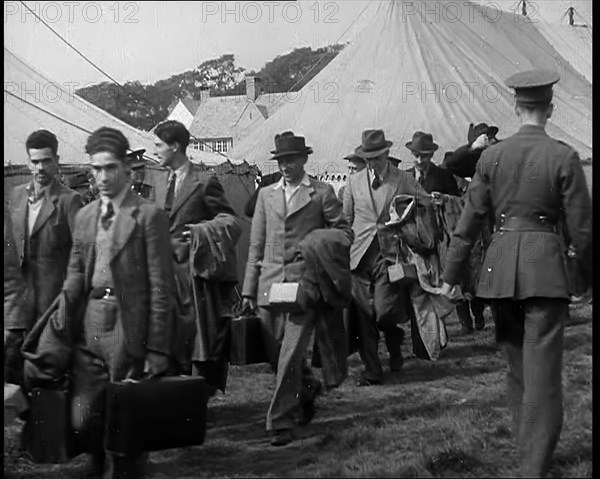 Aliens Walking to an Internment Camp, 1940. Creator: British Pathe Ltd.