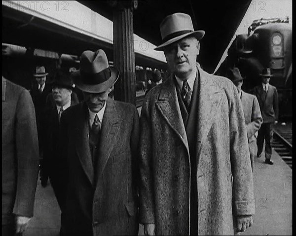 Henry Ford and His Entourage Walking Towards the Camera, 1930s. Creator: British Pathe Ltd.