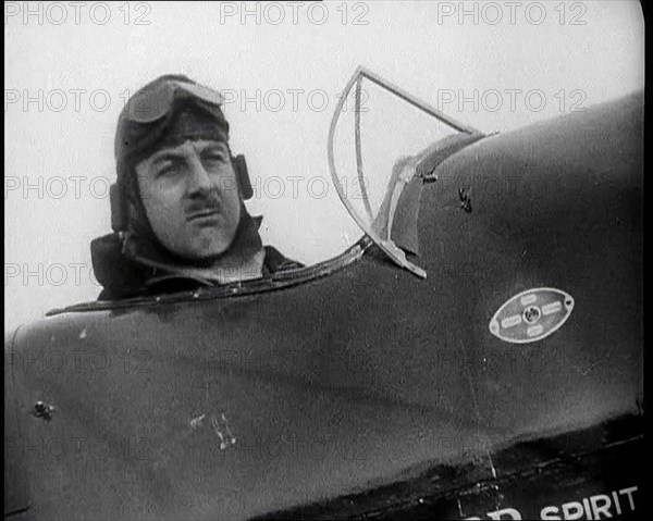 Alan Cobham in the Cockpit of a Plane, 1930s. Creator: British Pathe Ltd.