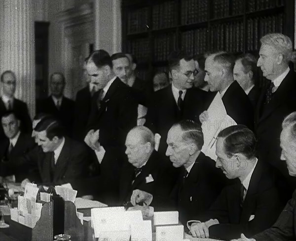 Winston Churchill and Wendell Willkie Signing an Agreement Allowing the USA to use British..., 1941. Creator: British Pathe Ltd.