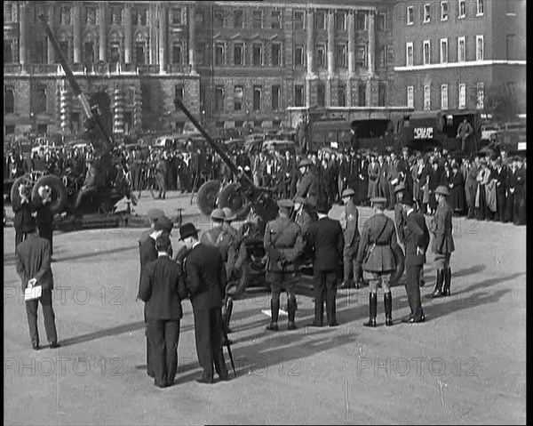 Anti-Aircraft Guns in Horseguard's Parade With Army Officers Attending and Bystanders Look..., 1937. Creator: British Pathe Ltd.