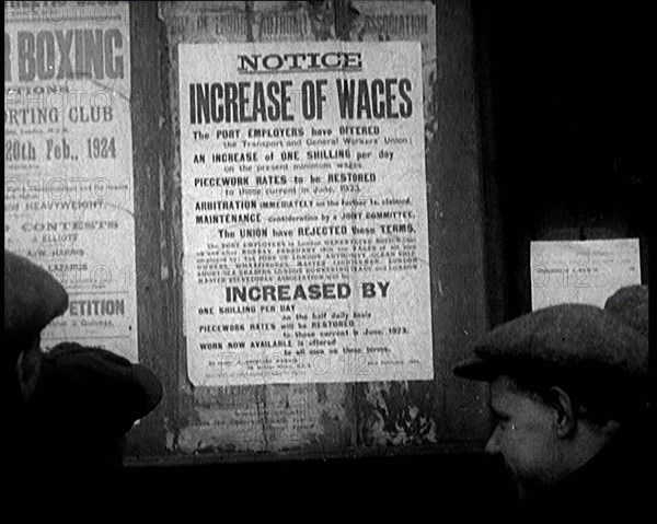 A Group of People Looking at a Sign. the Sign Reads 'Notice Increase of Wages', 1924. Creator: British Pathe Ltd.