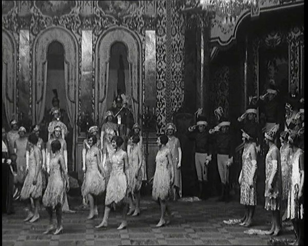 Scene from the Musical Princess Charming: a Group of Actors Dancing As the Actor Playing..., 1920s. Creator: British Pathe Ltd.