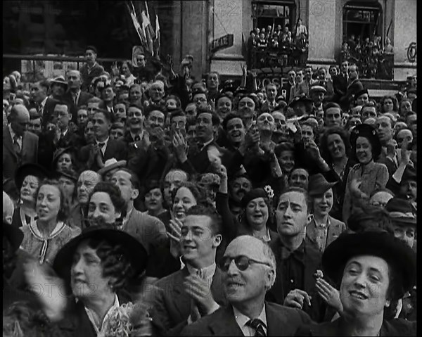 Close up a Section of the Crowd Spectating at  a Bastille Day Military Parade With People..., 1939. Creator: British Pathe Ltd.