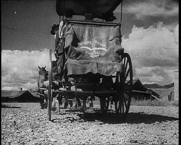 Coach and Horses Waiting To Pick up Passengers Arriving Off the Train, 1932. Creator: British Pathe Ltd.