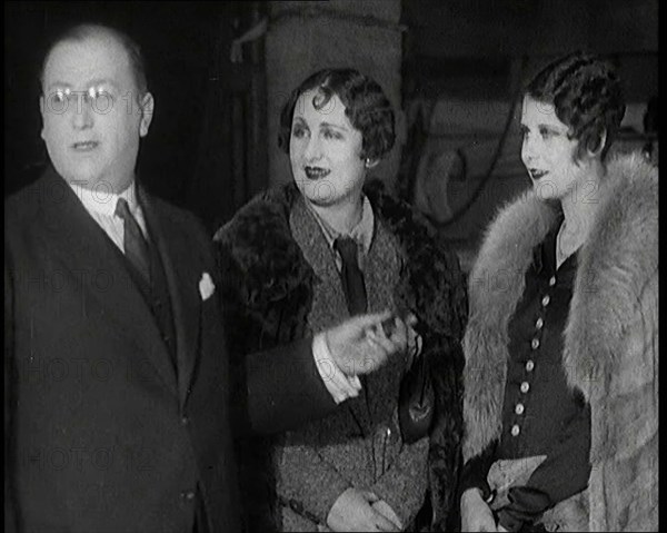 The Producer Julian Wylie Inspecting Young Prospective Female Stage Performers Standing..., 1920s. Creator: British Pathe Ltd.