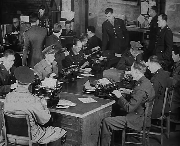 Uniformed Press Officers Working, 1943. Creator: British Pathe Ltd.