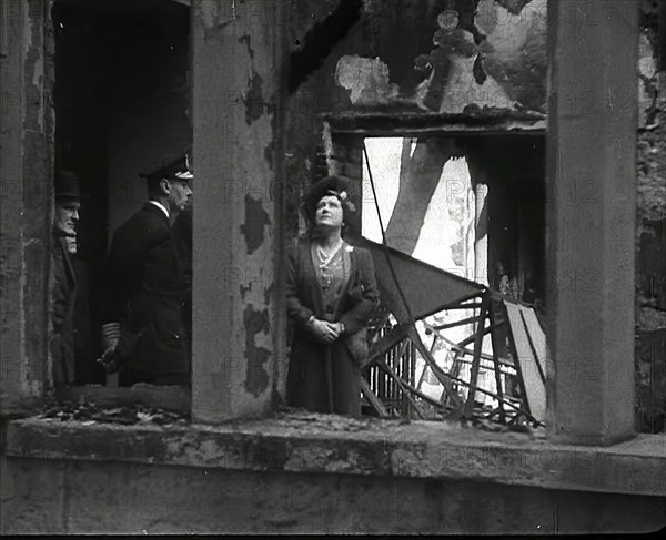 King George VI and Queen Elizabeth Inspecting Bomb Damage, 1942. Creator: British Pathe Ltd.