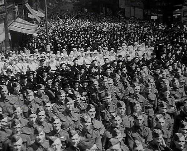 A Crowd of Soldiers Listening to a Speech by Lord Beaverbrook, Birmingham, 1942. Creator: British Pathe Ltd.