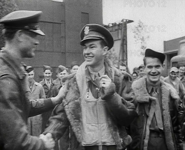 A Male Pilot Shaking Hands with an Officer, 1943-1944. Creator: British Pathe Ltd.