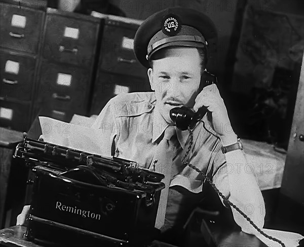 A Uniformed Journalist Working, 1943. Creator: British Pathe Ltd.