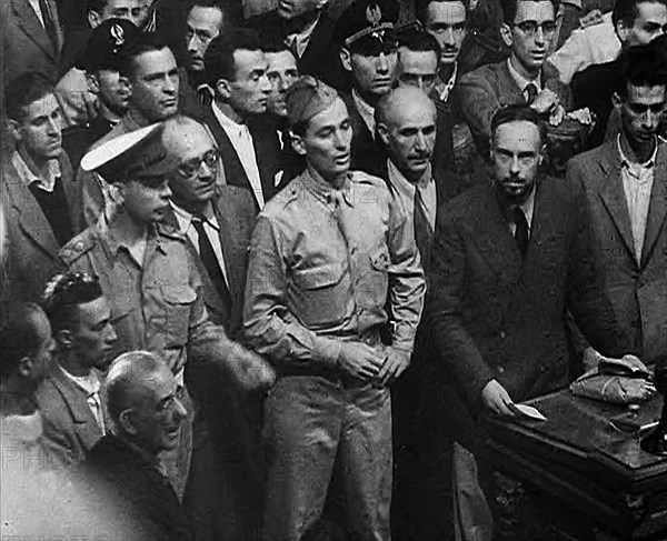 Two Soldiers at a Trial of Leading Fascists, 1944. Creator: British Pathe Ltd.