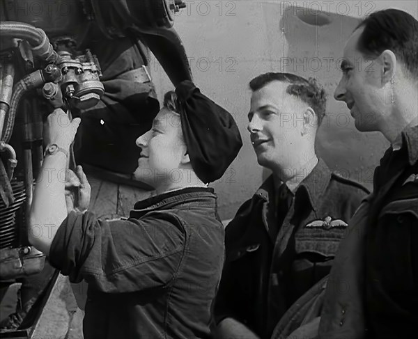 People Inspecting Part of an Aeroplane, 1942. Creator: British Pathe Ltd.