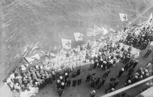 Flags greet Wilson, between c1915 and c1920. Creator: Bain News Service.