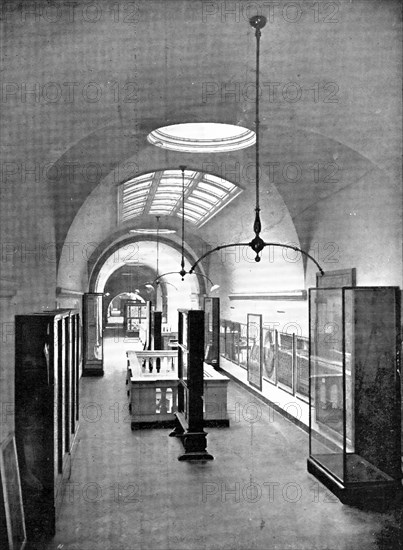 ...The Victoria and Albert Museum: the Long Gallery on the first floor..., 1909. Creator: Clarke & Hyde.