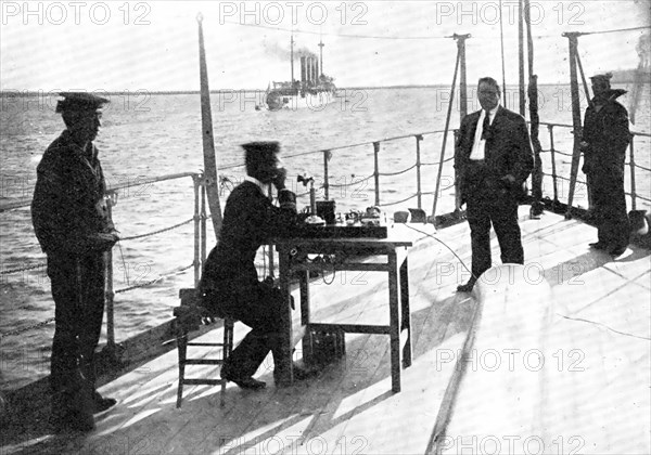 Telephoning By Means Of The Collins Wireless System Between Japanese War-Ships, 1909. Creator: George Grantham Bain.