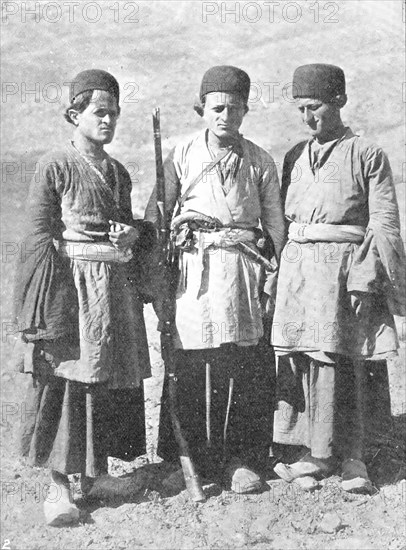 Threateners of Teheran: men who may capture the Shah - three young Bakhtiaris, 1909. Creator: Unknown.