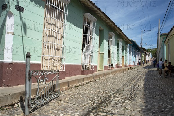 A typical cobblestoned side street in the Colonial UNESCO Heritage site city of Trinidad, Cuba, 2024 Creator: Ethel Davies.