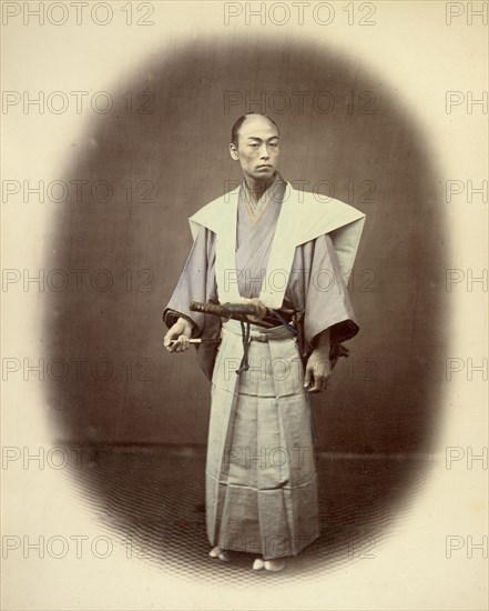 Japanese Yakonin in Dress of Ceremony, 1866-1867. Creator: Felice Beato.