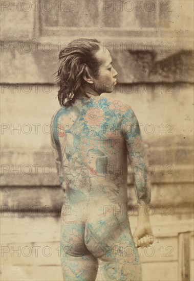 Back view of a tattooed Japanese man, 1868-1880. Creator: Felice Beato.