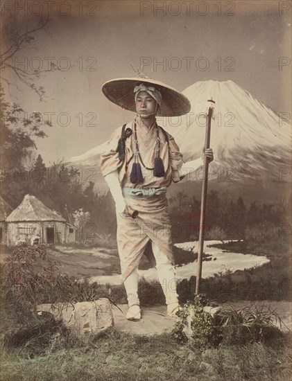 Pilgrim Going Up Fujiyama, 1870s-1890s. Creator: Kusakabe Kimbei.