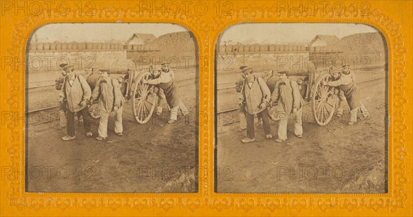 Men pushing and pulling a wagon, 1855-1860. Creator: Unknown.