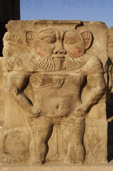 Relief of the god Bes, capital of column, Temple of Hathor, Dendera, Egypt, 2003. Creator: LTL.