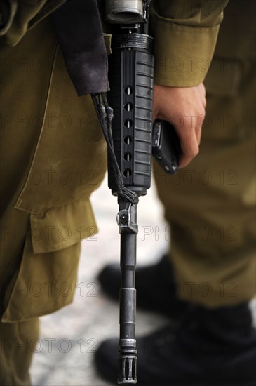 Firearm detail, soldier at the Western Wall, Jerusalem, Israel, 2013. Creator: LTL.