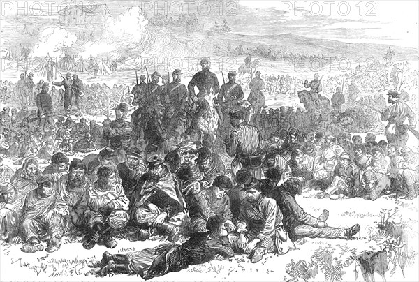 The Late Events in Paris: captive insurgents of Belleville guarded in the Parc des Buttes..., 1871. Creator: Unknown.