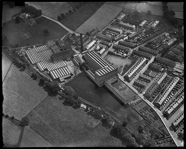 Sutton Worsted Mills on Bridge Street, Sutton-in-Craven, North Yorkshire, c1930s. Creator: Arthur William Hobart.