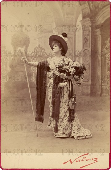 Sarah Bernhardt as Floria Tosca in Act I of Sardou's 'Tosca', neg 1887; print and mount after 1889. Creator: Nadar.