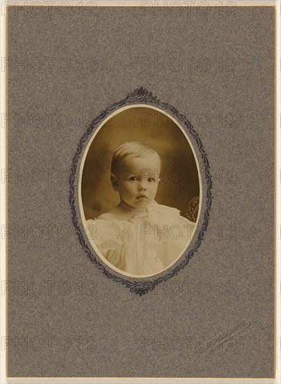 Portrait of a baby boy, about 1900. Creator: Benjamin.